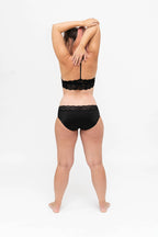 Dear Kate Ada Hipster Mini worn on model, side view on a white background.