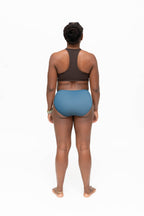 Dear Kate Nellie Hipster Mini worn on model, front view on a white background.