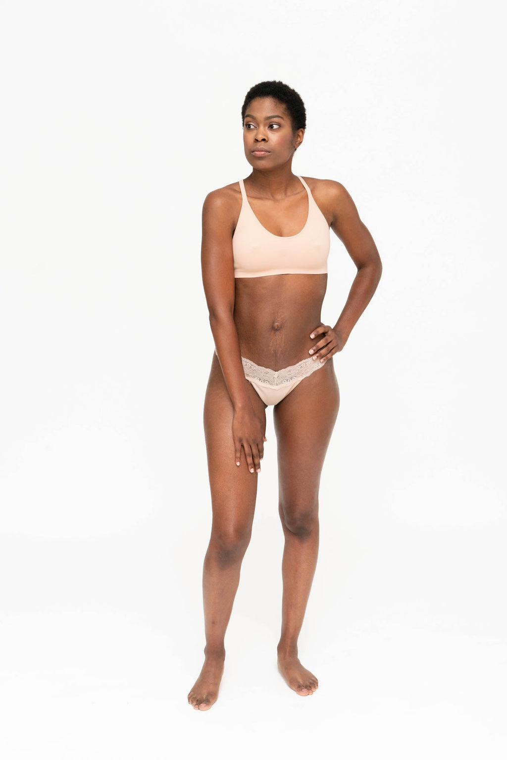 Dear Kate Ada Thong worn on model, back view on a white background.