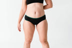 Dear Kate Hazel Hipster Full in Emerald, worn on model, front view on a white background.