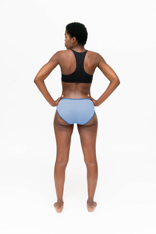 Dear Kate Hazel Hipster Mini worn on model, back view on a white background.