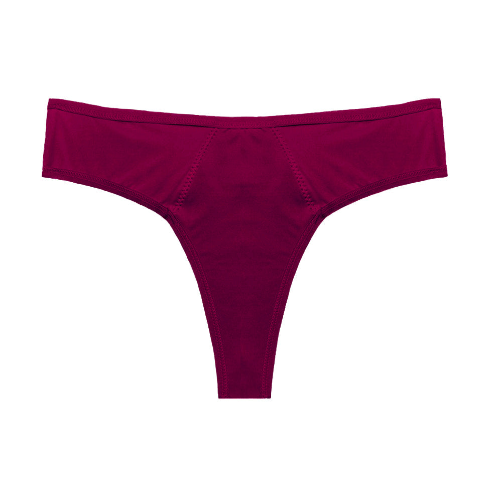 Dear Kate Nellie Thong in Ruby Red, front view on a white background.