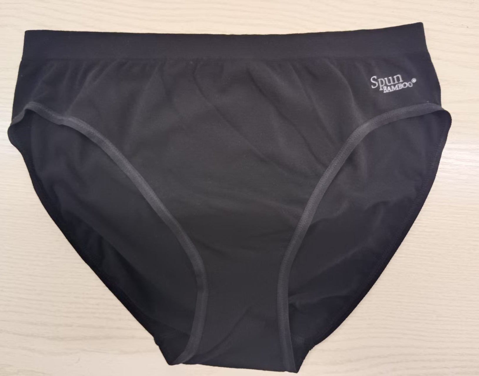 Spun Bamboo PantyBoo Women's High Leg Brief worn on model, side view on a white background.