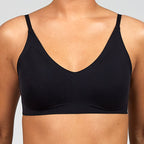 The Only Bra Only Adjustable Bra in Black, worn on model view on a white background.
