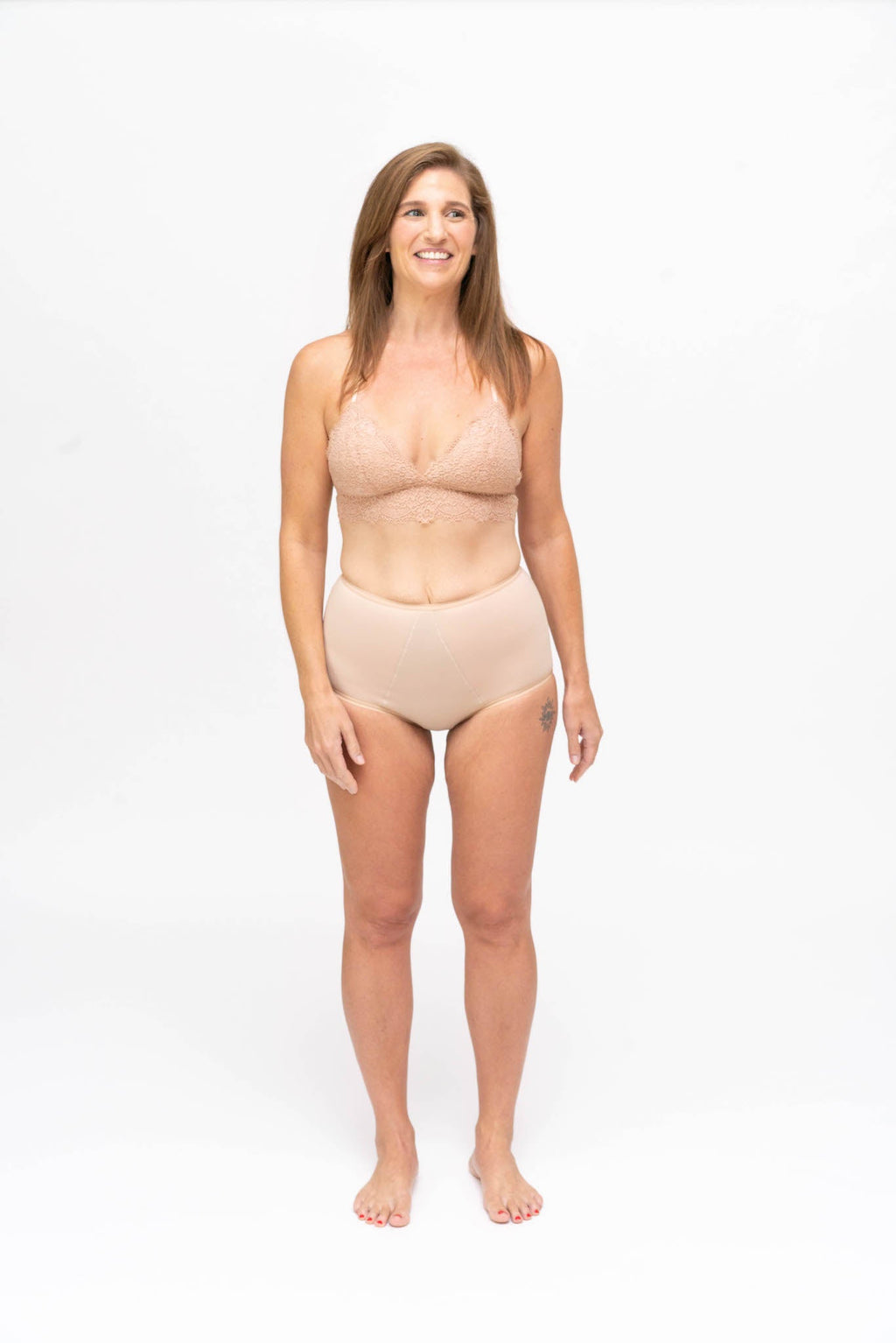 Dear Kate Nellie Brief Full in Beige, front view worn on model on a white background.