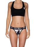 Ginch Gonch El Toro Women's Thong in bull-rider print, 95% Cotton 5% Spandex stretch underwear with a black sports bra worn by a model.
