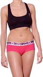 Ginch Gonch gogo brief pink and white color stretchable cotton underwear worn with a black sports bra by a model with a white background.