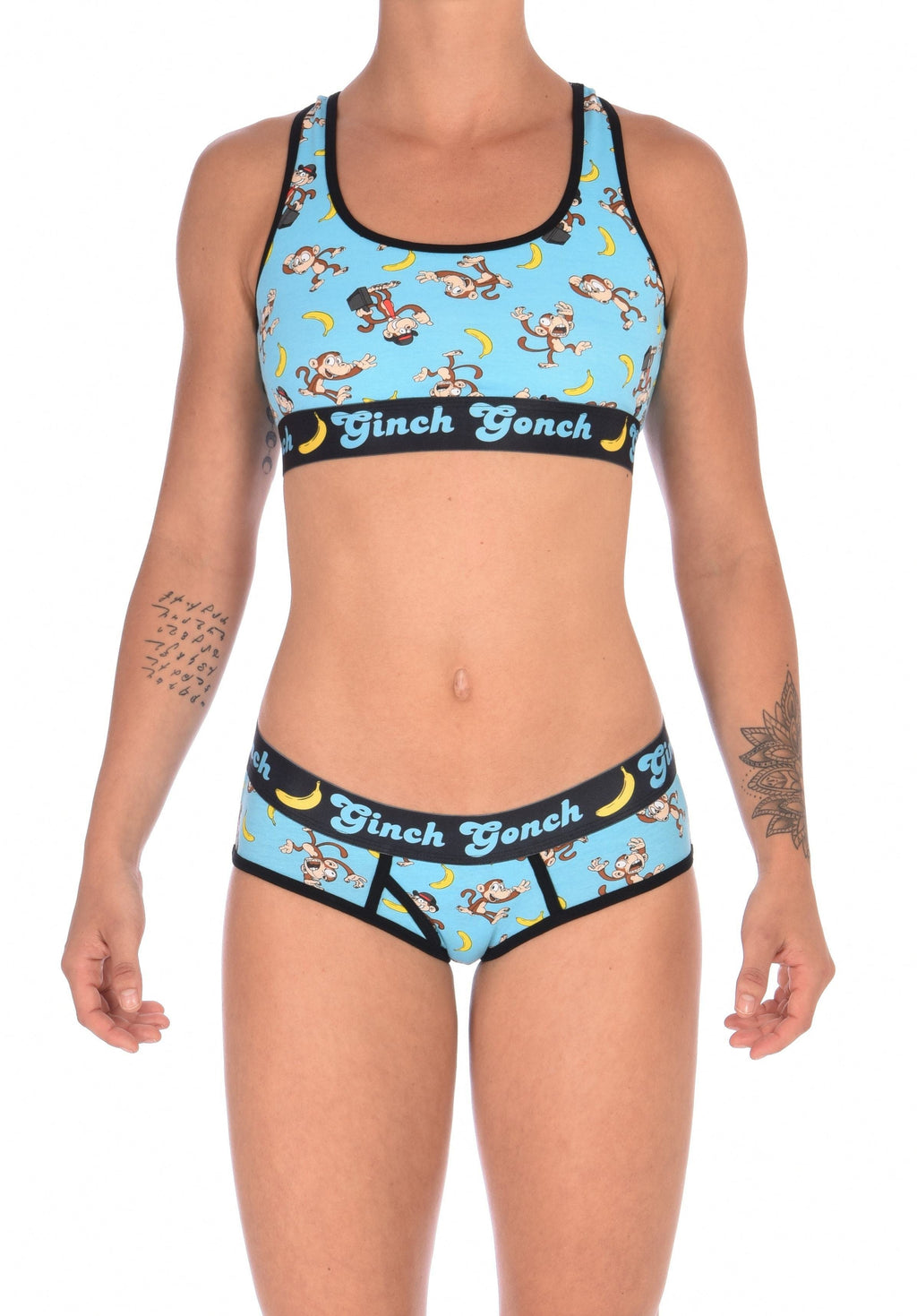 Ginch Gonch Monkey Business Women's Boyfriend Briefs, aqua monkey print, relaxed boyfriend cut, anti muffin-top waistband, worn by a model with matching sports bra.