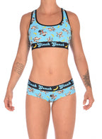 Ginch Gonch Monkey Business Women's Gogo Briefs in aqua blue monkey print, gogo cut with anti muffin-top waistband, worn by model with matching sports bra.