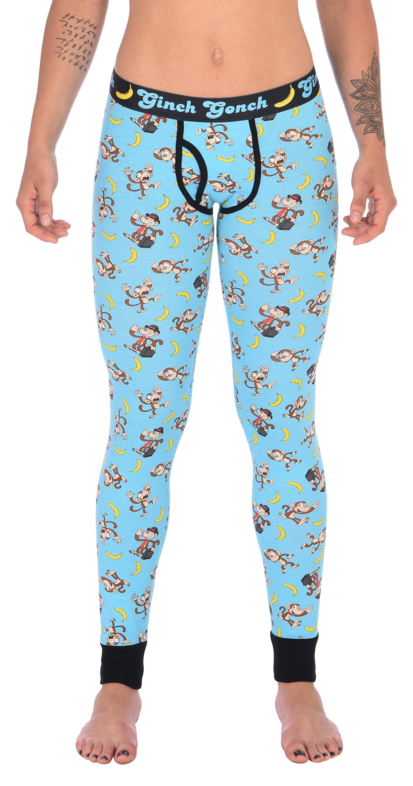 Ginch Gonch Monkey Business Women's Leggings, aqua blue with black waistband and cuff, all-over monkey banana print, 4-way stretch cotton worn by a model.