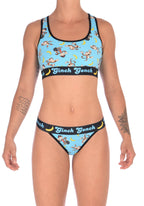 Ginch Gonch Monkey Business Women's Thong, aqua monkey print with black waistband, thong cut, anti muffin-top waistband worn by a model with matching sports bra.