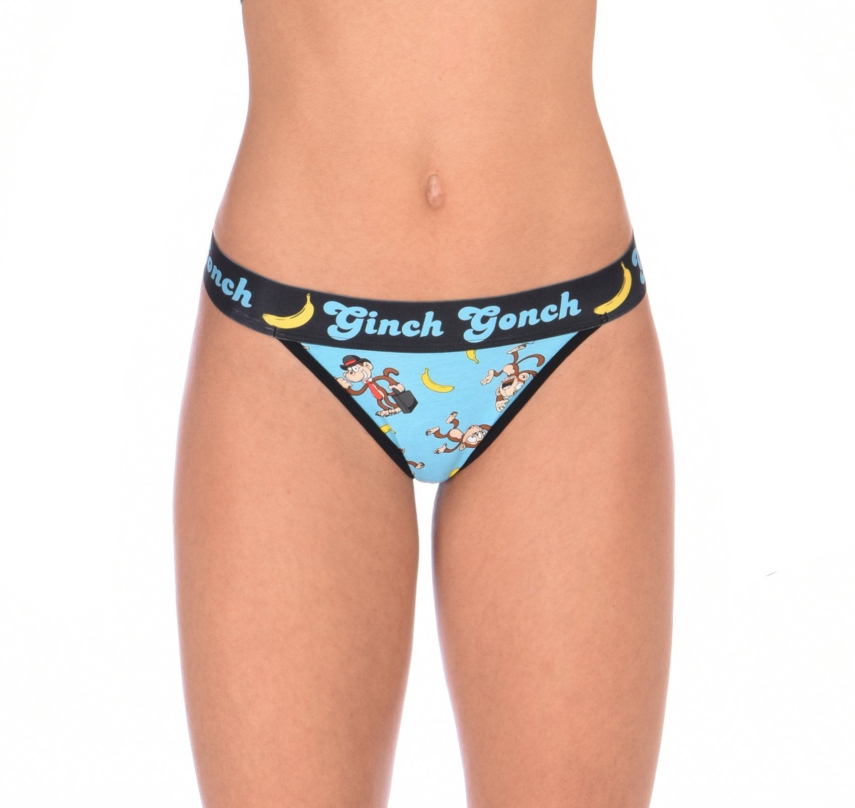 Ginch Gonch Monkey Business Women's Thong, aqua blue with black waistband and monkey banana print, anti muffin-top, stretch cotton, close-up on model.
