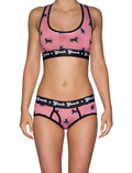 Ginch Gonch Wild Bulls Women's Boyfriend Briefs, red and white stripe with all-over bull print, 4-way stretch fabric, worn by a model with matching sports bra.