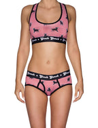 Ginch Gonch Wild Bulls Women's Boyfriend Briefs, red and white stripe with all-over bull print, 4-way stretch fabric, worn by a model with matching sports bra.