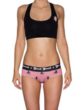 Ginch Gonch Wild Bulls Women's Gogo Briefs, red and white stripe with all-over bull print, 4-way stretch fabric, worn by a model paired with black sports bra.