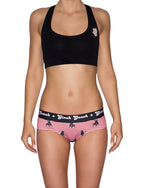 Ginch Gonch Wild Bulls Women's Gogo Briefs, red and white stripe with all-over bull print, 4-way stretch fabric, worn by a model paired with black sports bra.