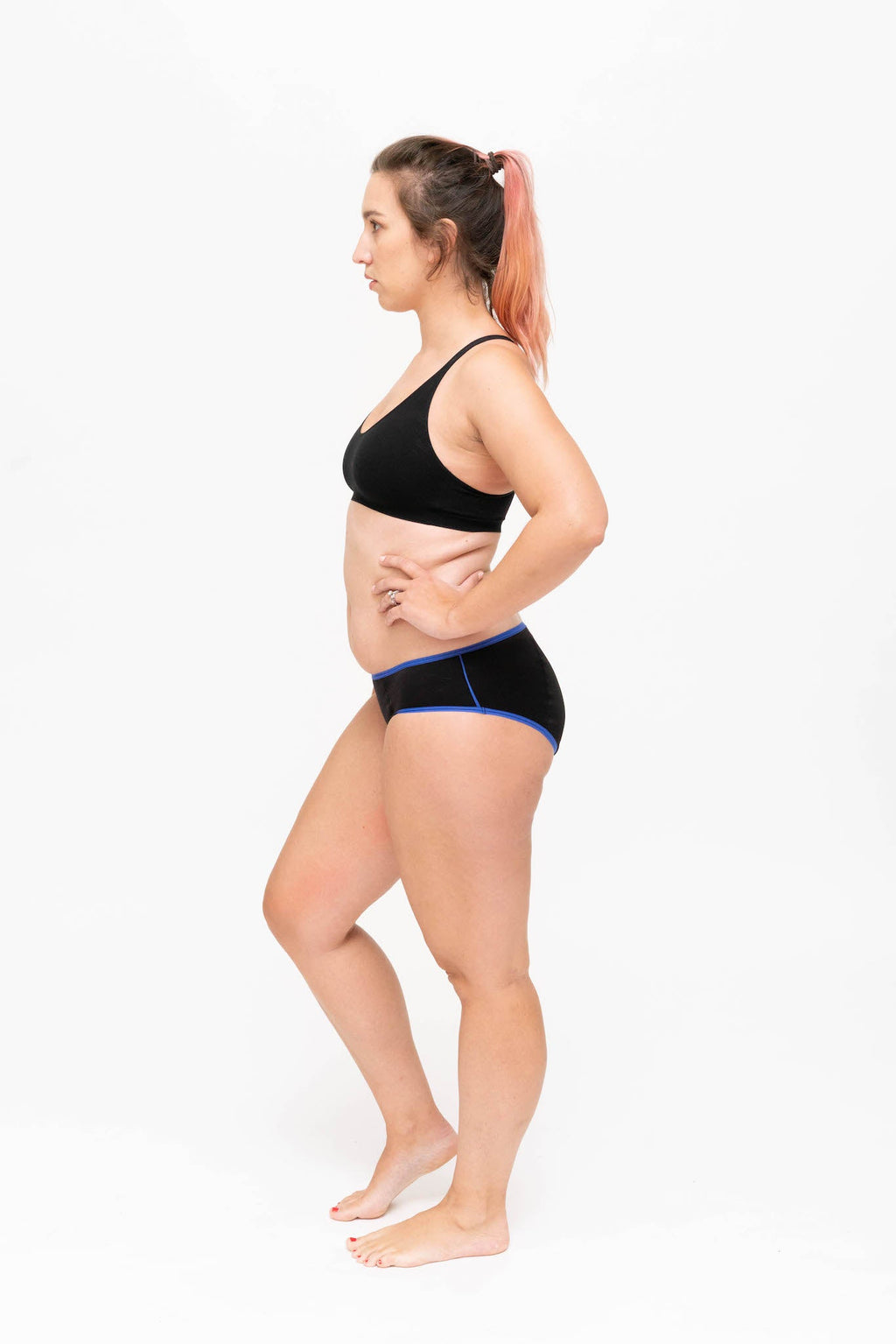 Dear Kate Hazel Hipster Full in Black with Blue Trim, worn on model, side view on a white background.