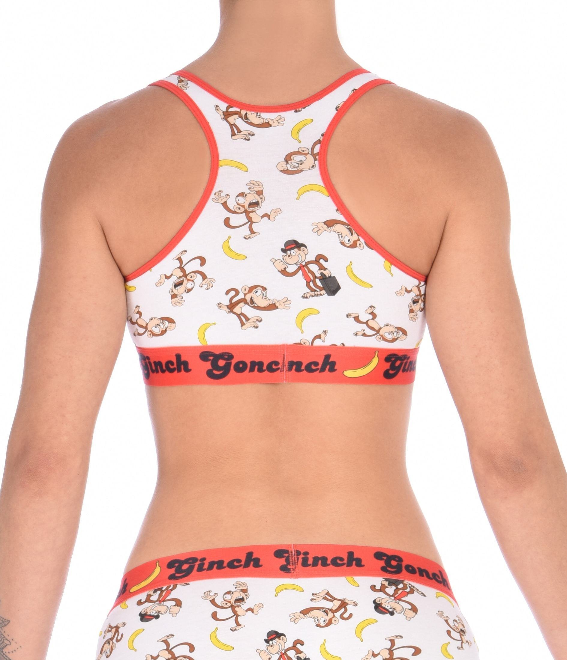 Rear view of a model wearing a Ginch Gonch Gone Bananas racerback sports bra showing racerback design and monkey print stretch cotton.