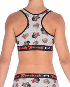 From the back, rear view of Ginch Gonch Pug Life sports bra showing racerback design and pug print stretch cotton fabric