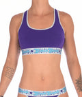 Ginch Gonch Purple Haze Women's sports bra in vibrant violet color design, 4-way stretch cotton racerback bralette worn by a model.