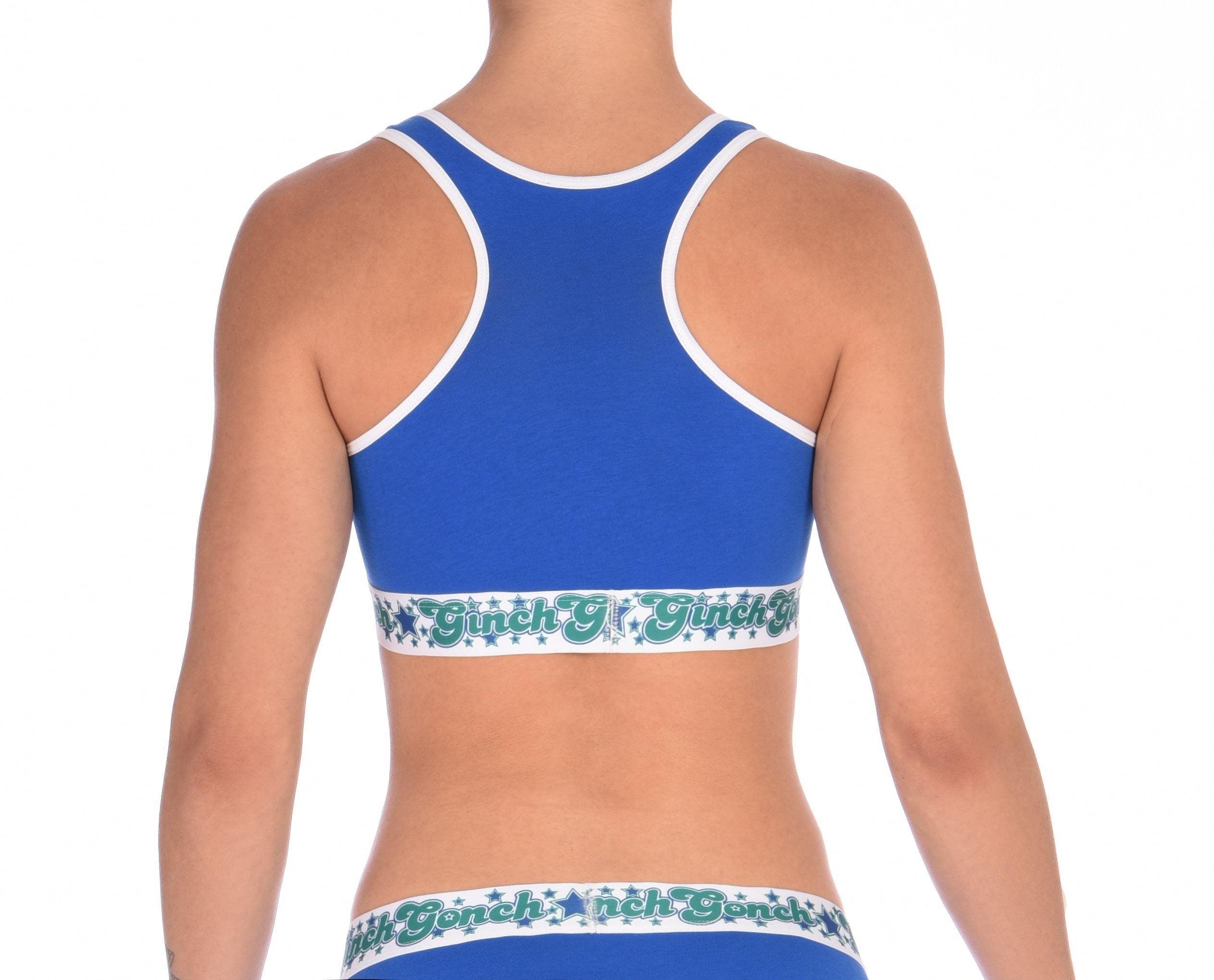 Rear detail view of Ginch Gonch Blue Lagoon sports bra showing racerback strap design in solid royal blue stretch cotton
