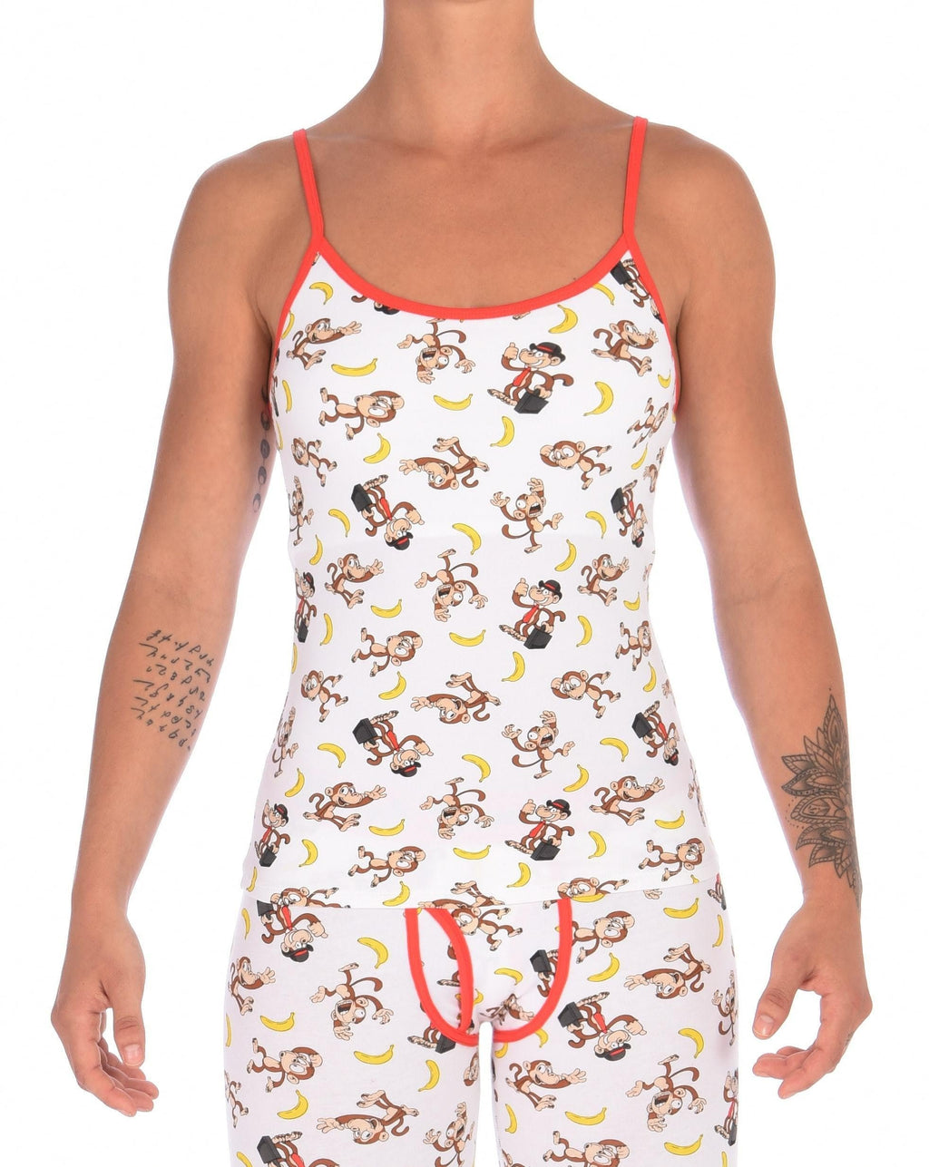 Front view of a model wearing of Ginch Gonch Gone Bananas cami showing adjustable straps and monkey print cotton fabric.