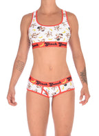Full body view of a model wearing a Ginch Gonch Gone Bananas boyfriend briefs showing full seat coverage and monkey print stretch cotton.