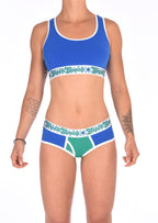 Detail of Ginch Gonch Blue Lagoon boyfriend briefs showing soft royal blue stretch cotton and comfortable elasticated waistband with matching sports bra