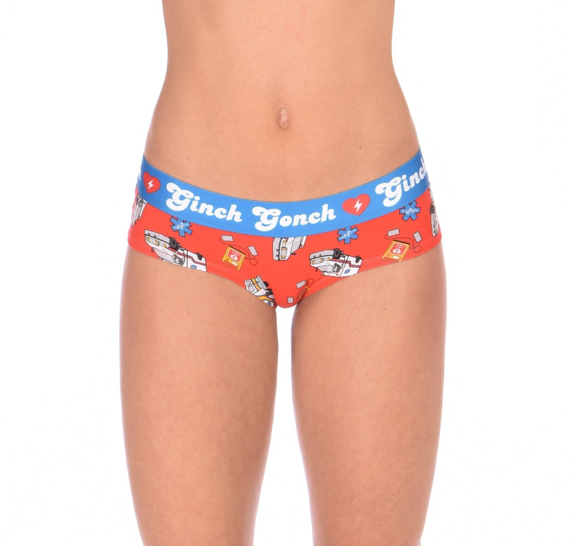 Ginch Gonch GG EMT Women's gogo briefs in orange playful medical-themed print, 4-way stretch cotton low-rise bikini cut, worn by a model.