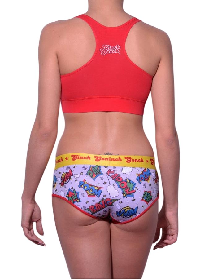 Rear view of Ginch Gonch Under-Man boyfriend briefs showing full seat coverage and superhero print stretch cotton worn with a racerback sports bra by a model.
