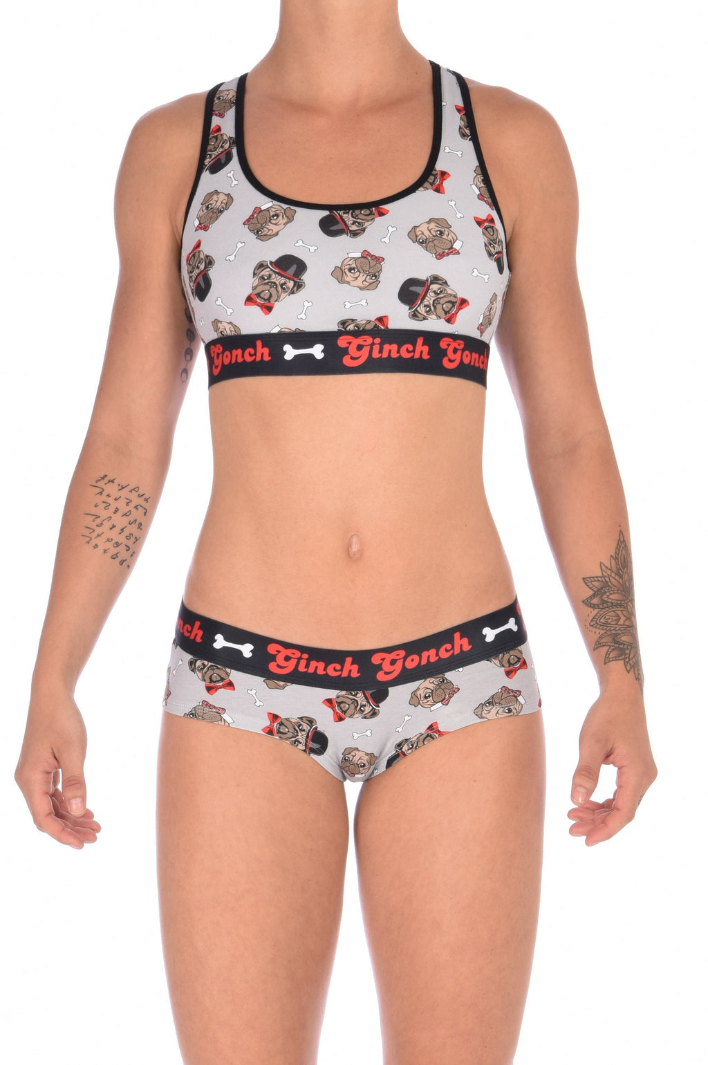 Front view of a model wearing a Ginch Gonch Pug Life grey gogo briefs showing anti-muffin waistband and pug print stretch cotton with matching printed sports bra.
