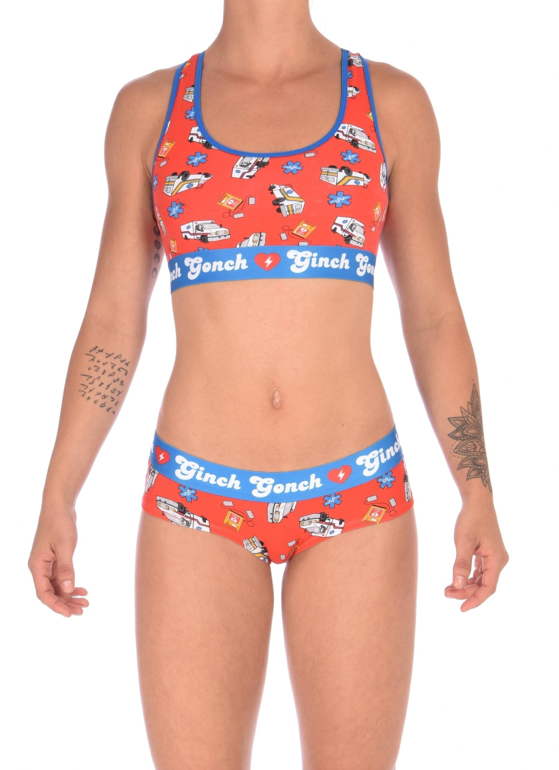 Full version view of a model wearing a Ginch Gonch GG EMT gogo briefs showing anti-muffin waistband and medical print stretch cotton set with the matching sports bra.