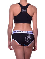 Rear view of rear view of Ginch Gonch Book'em boyfriend briefs showing full seat coverage and police print stretch cotton