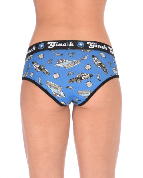 Rear view of a model wearing Ginch Gonch GG Patrol blue boyfriend briefs showing full coverage and police print stretch cotton fabric.
