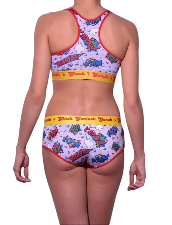 Rear view of a model wering Ginch Gonch Under-Man Women's sports bra in comic multicolor design, 4-way stretch cotton supportive racerback bralette with matching panty brief.