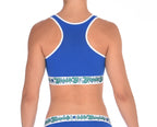 Rear view of Ginch Gonch Blue Lagoon sports bra showing racerback strap design in solid royal blue stretch cotton
worn by a model