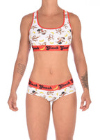 Full front view of a model wearing Ginch Gonch Gone Bananas gogo briefs showing anti-muffin waistband and monkey print stretch cotton with matching sports bra.