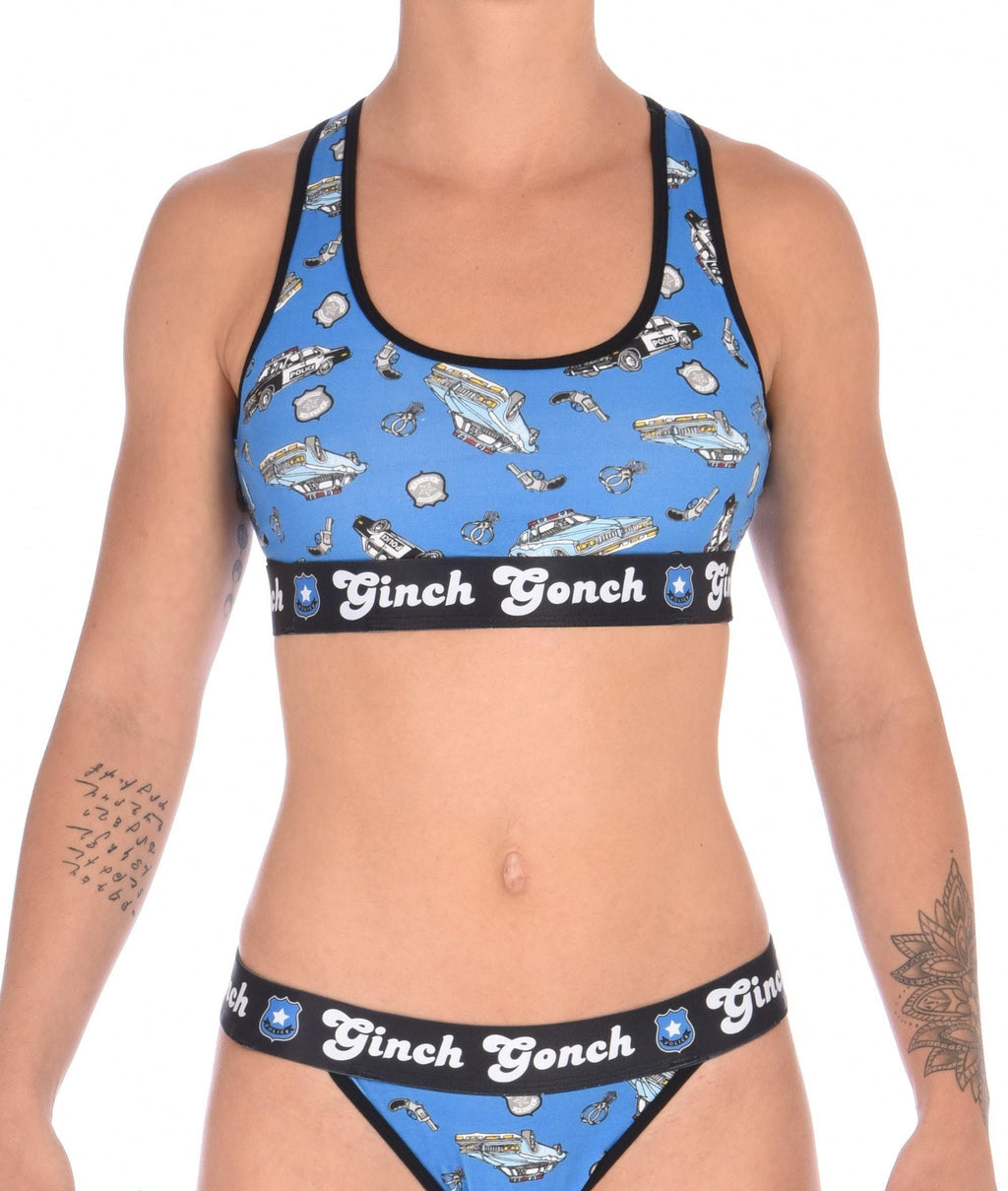 Seen from behind, rear view of Ginch Gonch GG Patrol sports bra showing wire-free back design and police print stretch cotton