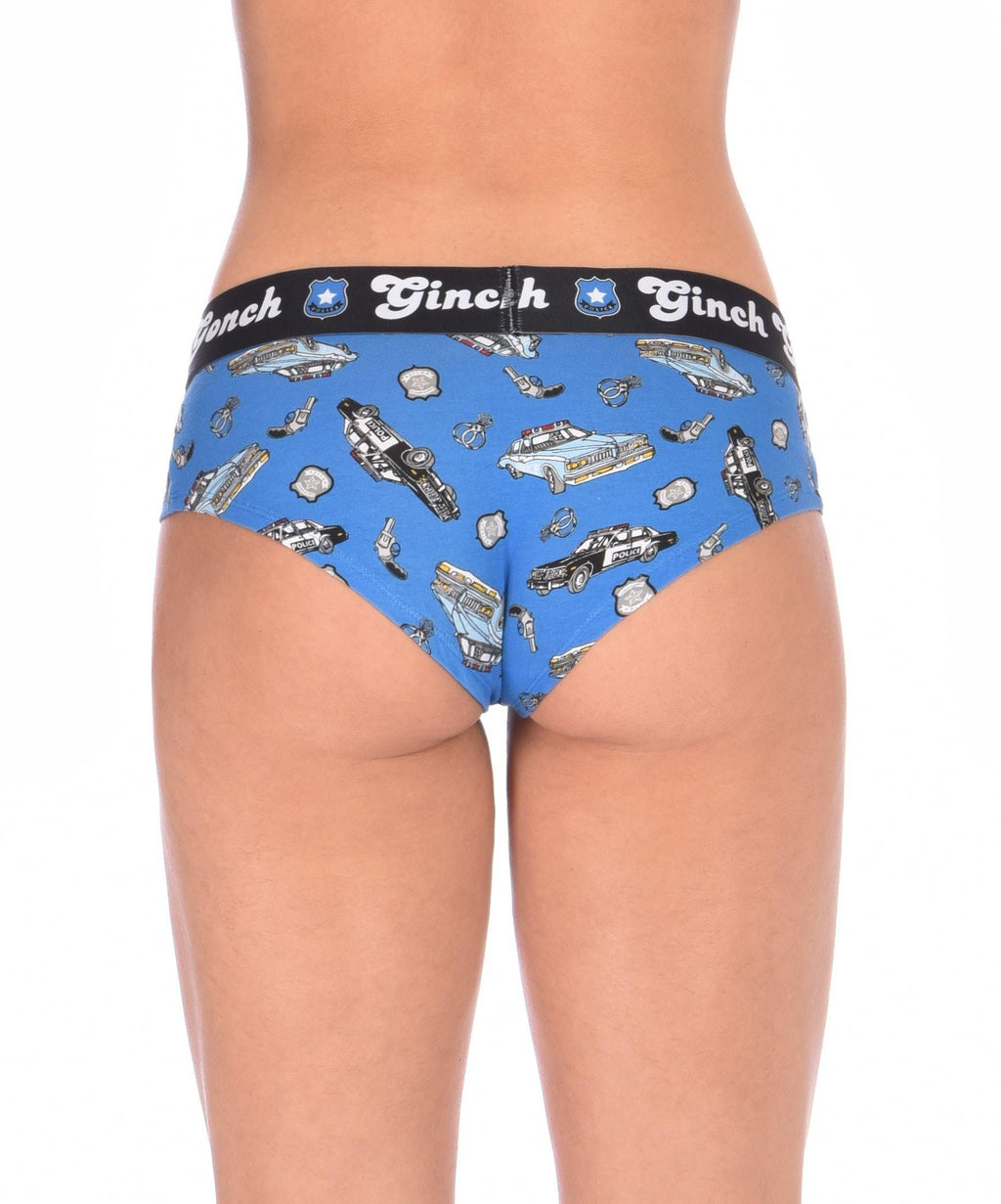 Rear view of a model wearing Ginch Gonch GG Patrol blue gogo briefs showing anti-muffin waistband and police print stretch cotton