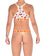 Seen from behind of a model wearing of Ginch Gonch GG Fire Fighters thong showing minimal coverage and firefighter print stretch cotton matched with a similar printed sports bra.