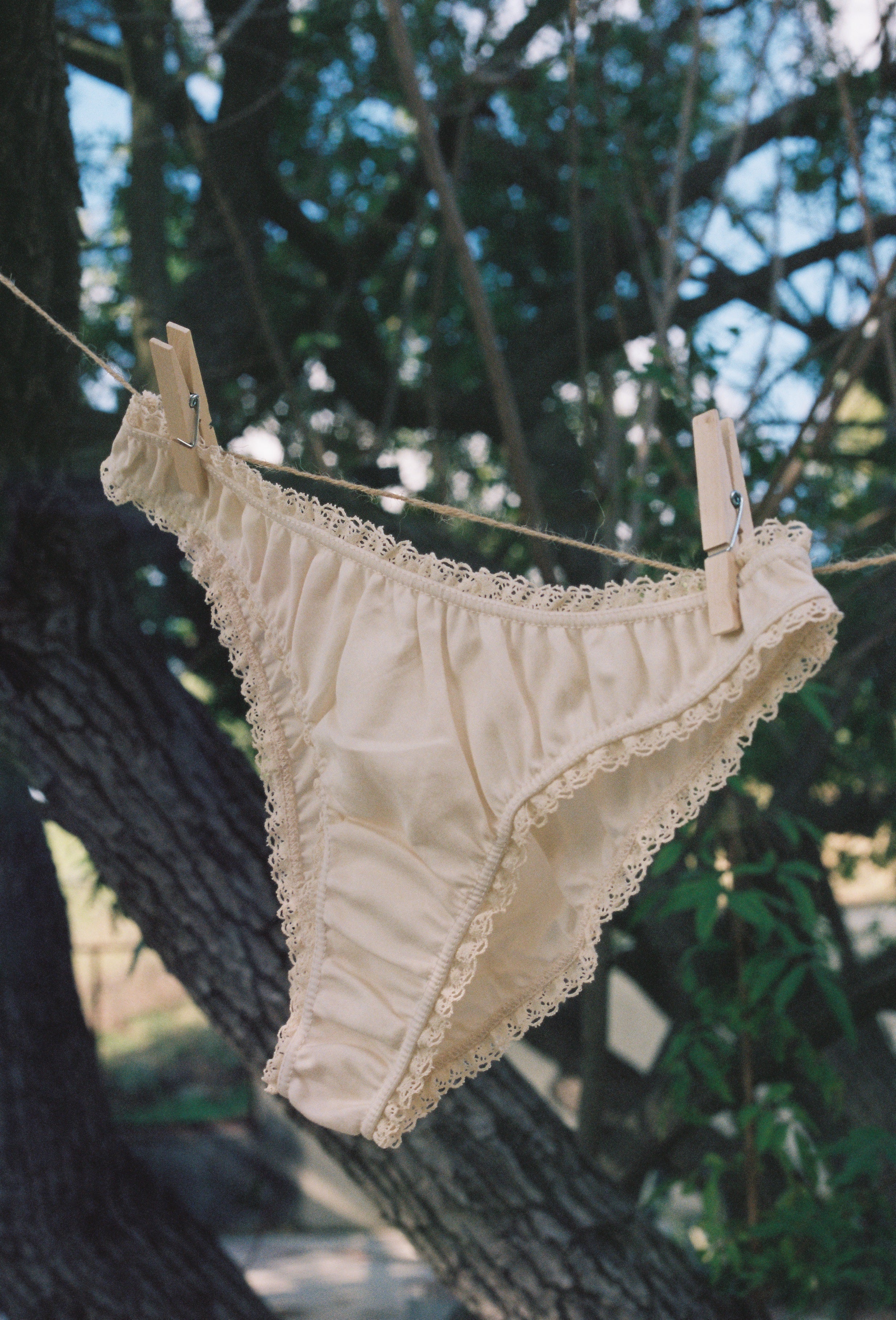 Paulette & Maria Beige organic cotton panties, outdoor nature lifestyle view.