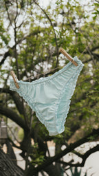 Paulette & Maria Pastel Blue cotton panties, outdoor lifestyle view.