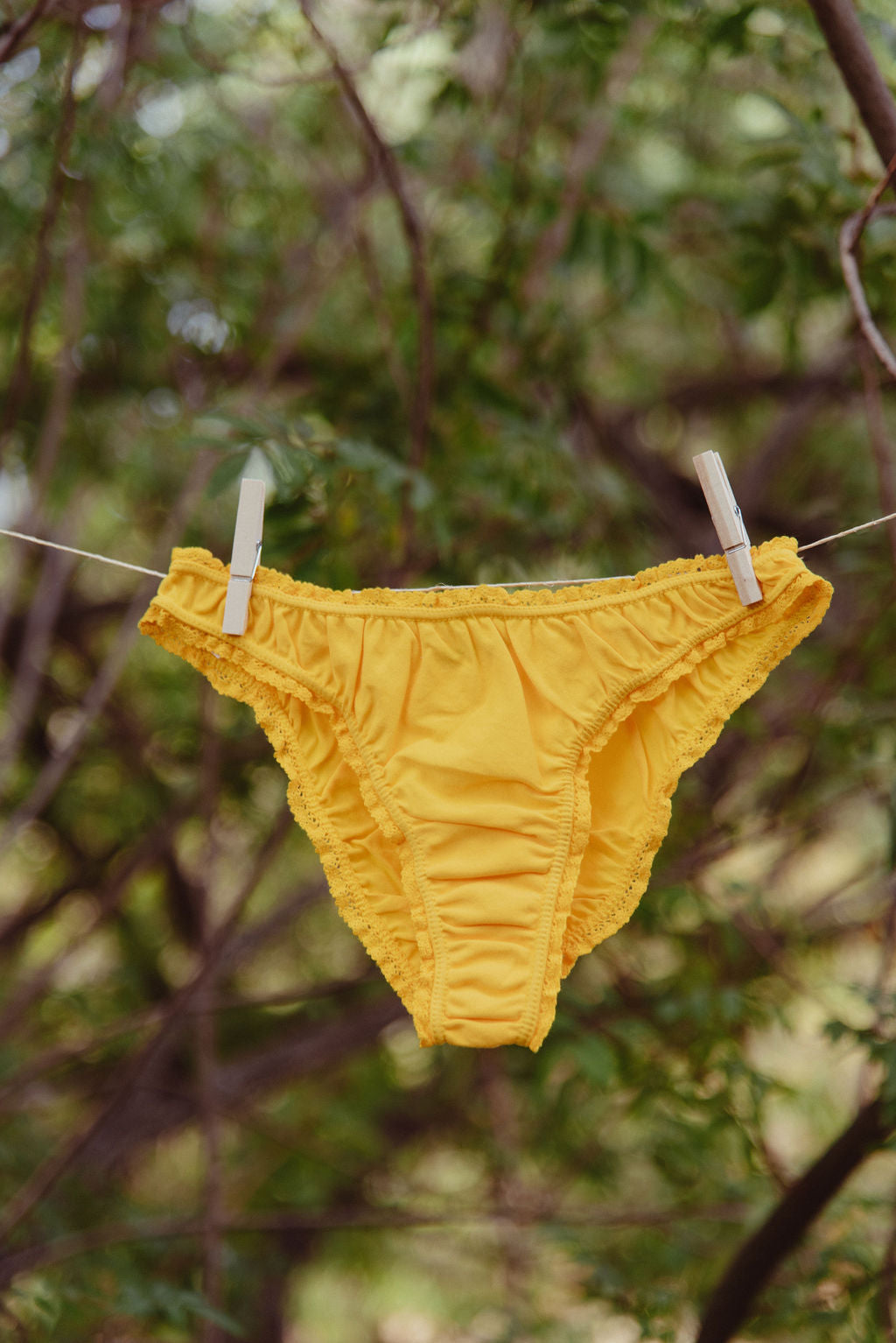 Paulette & Maria Yellow Lemon organic pima cotton frilly panties, lace trim detail on a white background.