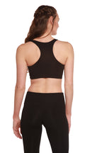 Spun Bamboo Women's Padded Sports Bra in Black, fabric texture detail on a white background.